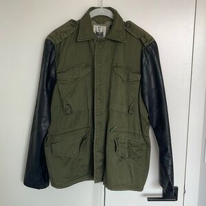 Military jacket with leather sleeves